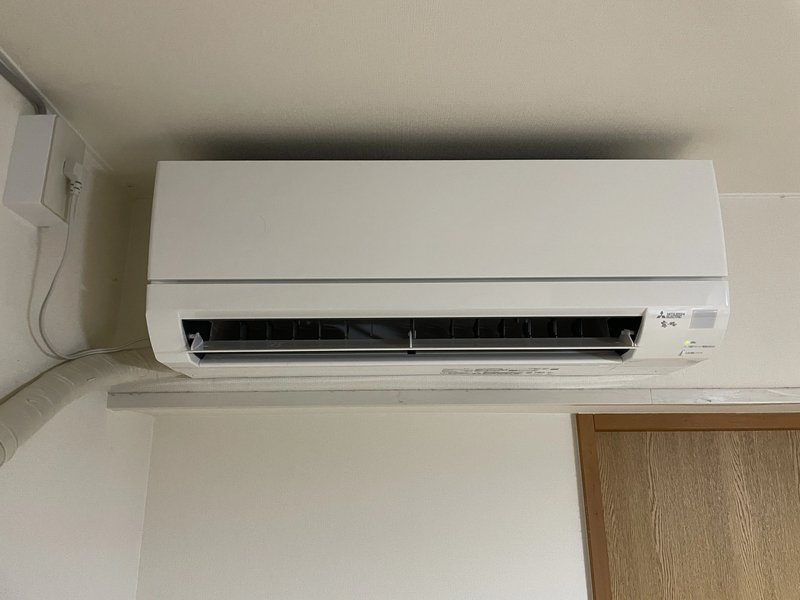 北見市春光町の市営団地に三菱エアコン取付・コンセント増設