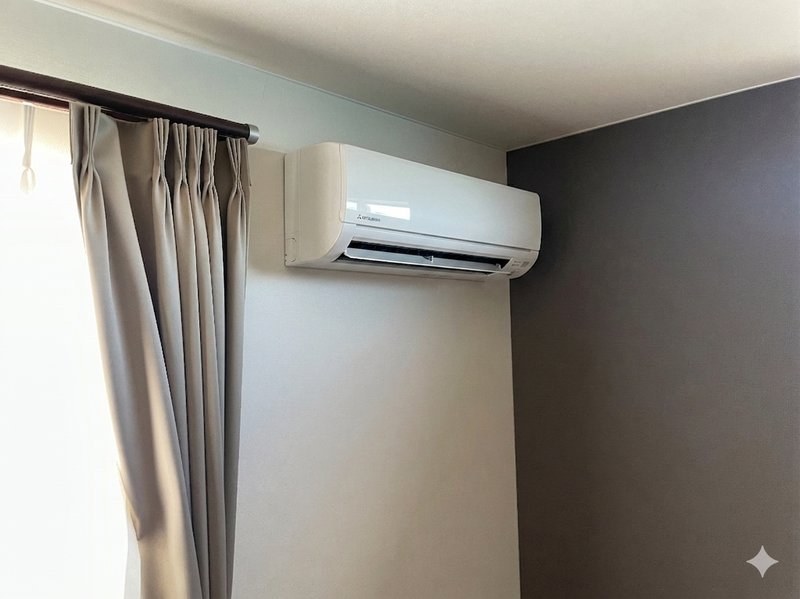 小清水町 施工後：寝室の三菱電機 霧ヶ峰 GVシリーズ 6畳用スタンダード室内機（グレーアクセントクロスの壁面上部に設置）